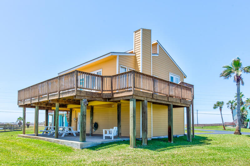 Back of the house with the elevated deck