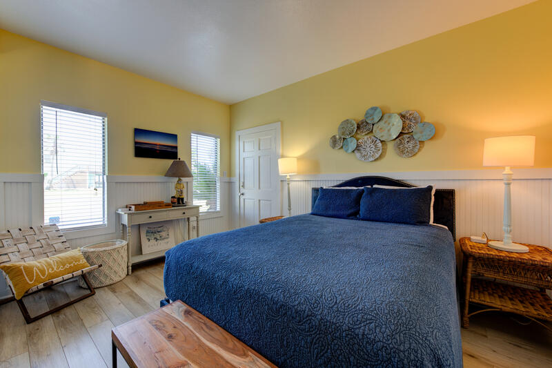 First-floor queen bed and nightstand